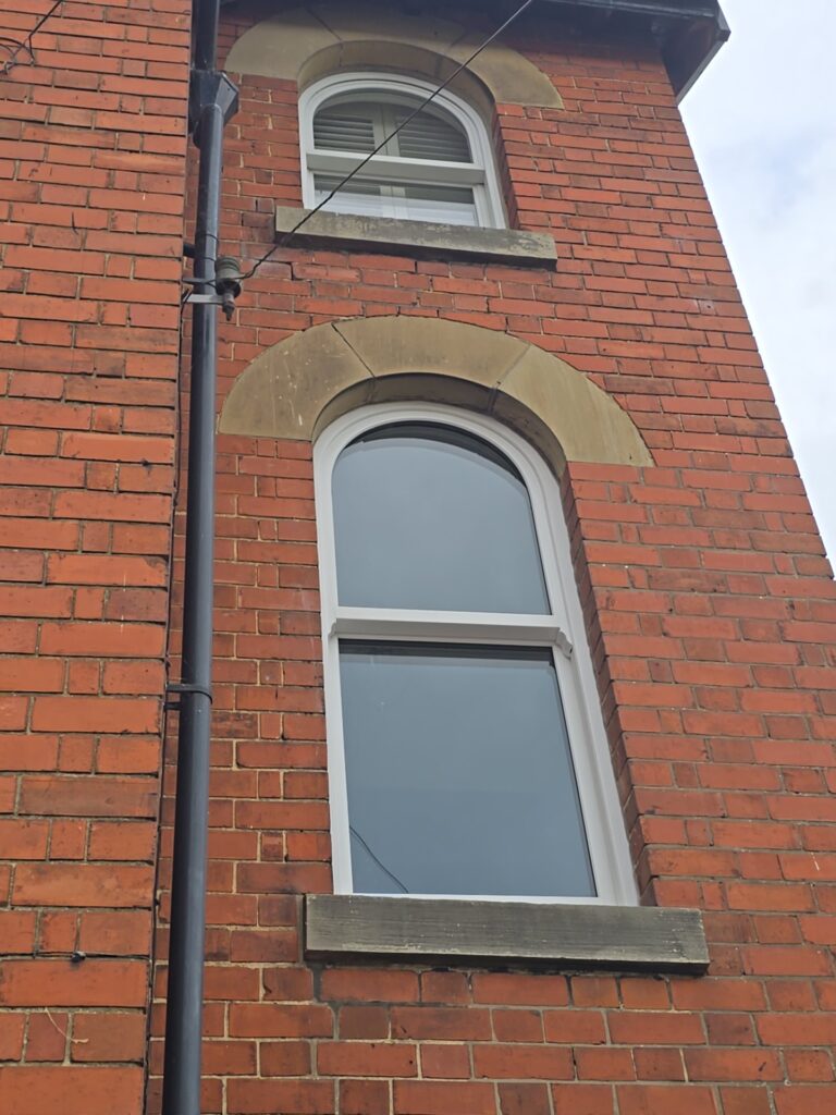 arched sliding sash windows