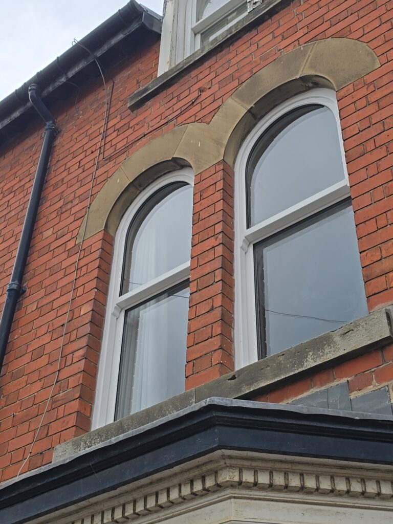 arched sliding sash windows